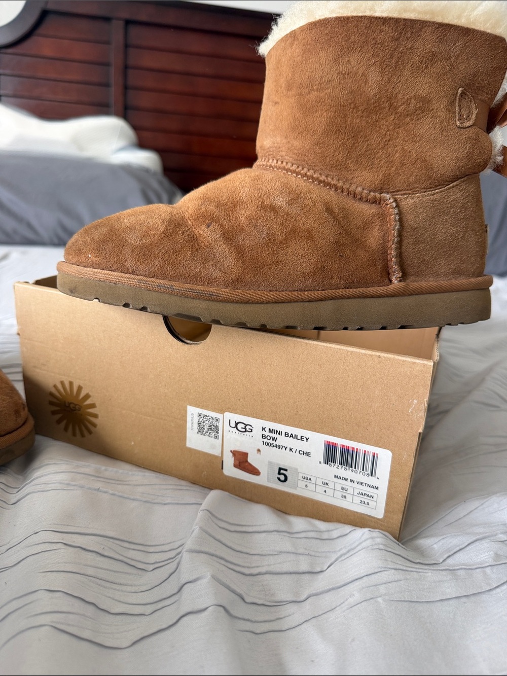 UGG Mini Bailey Bow Boots in Chestnut Suede